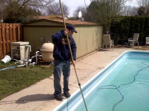 Mark Vacuuming the Pool