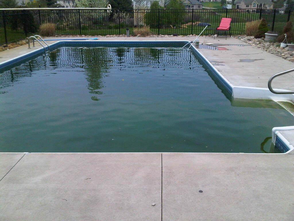 Opening a swimming pool in Michigan that has a safety cover