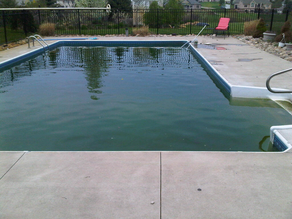 Opening a swimming pool in Michigan that has a safety cover