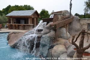 Small details make all the difference--like the antique water pump on this waterfall in a mining-themed pool.