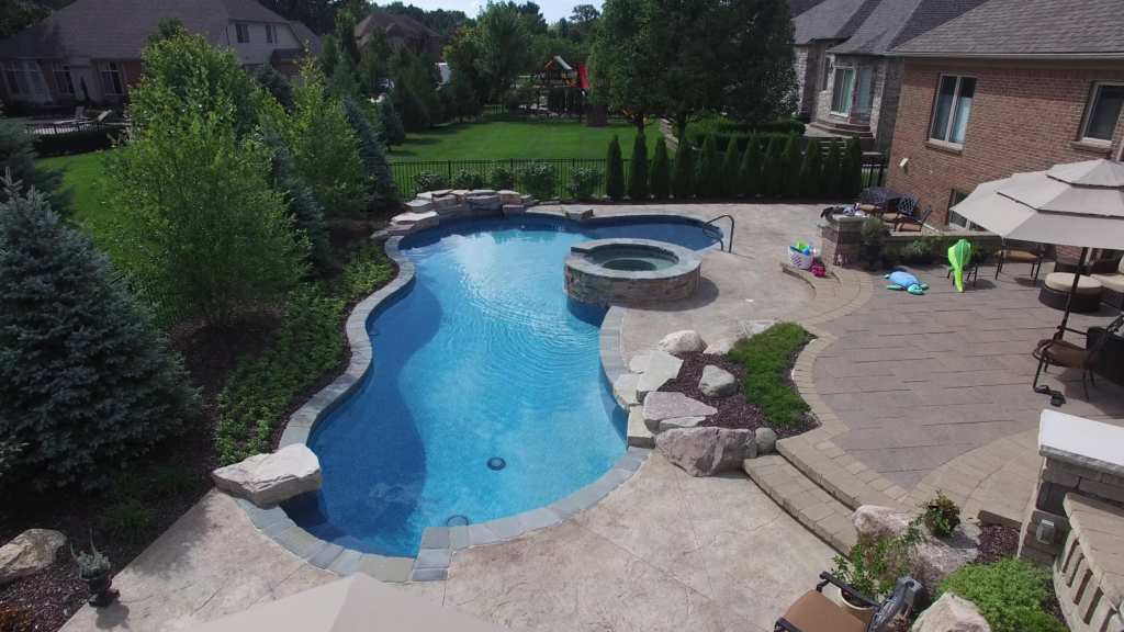 Shelby Township Michigan Hybrid Pool by Legendary Escapes